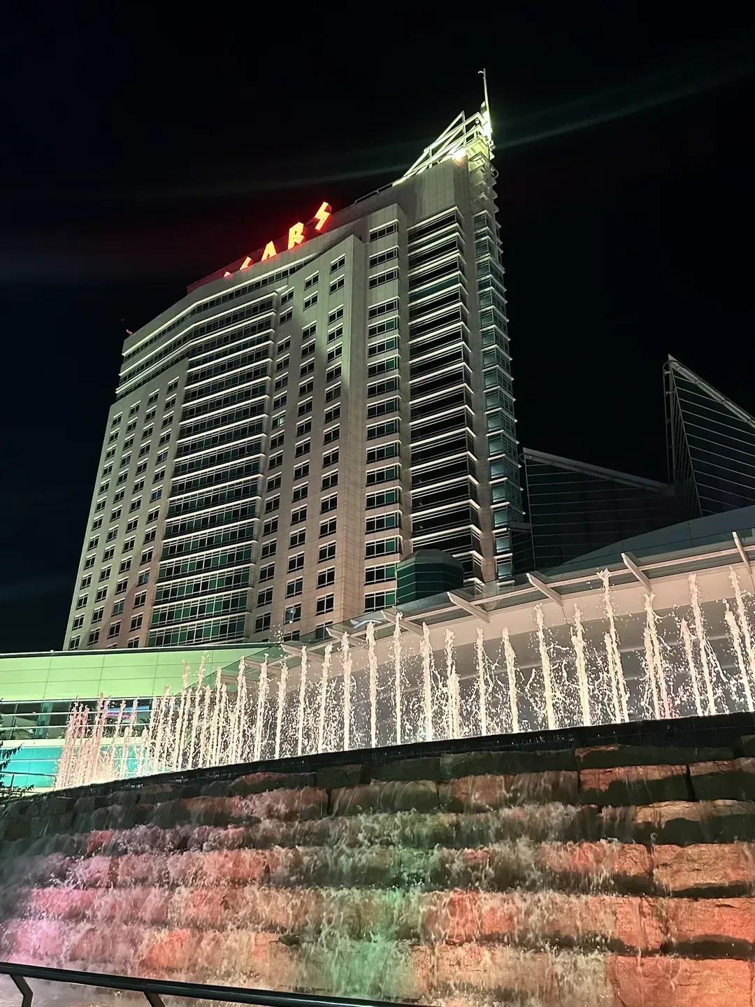 Waterfront hospitality exterior at dusk